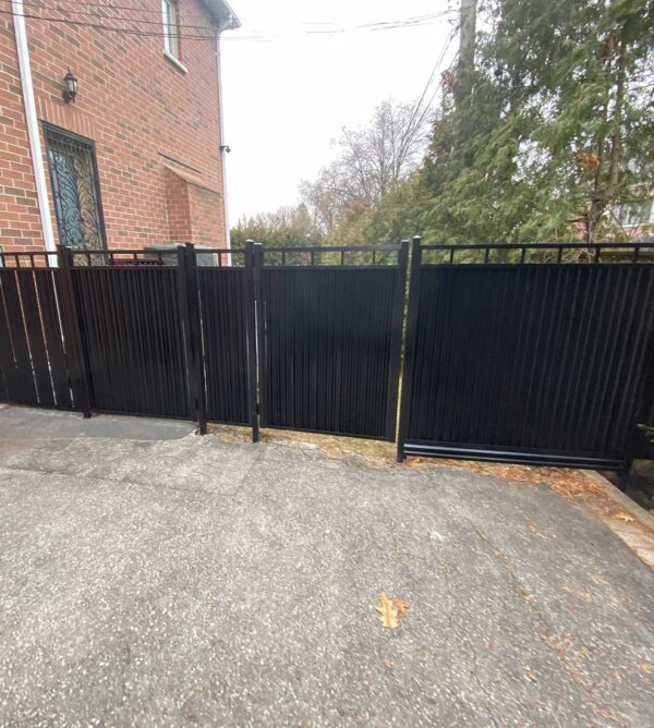 Corrugated-Aluminum-Privacy-Fence-Panels-Installed-in-Oakville-by-Toronto-Fence